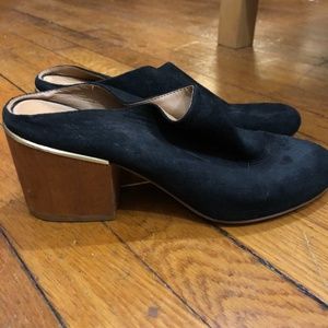 Calvin Klein black mules with wood heel